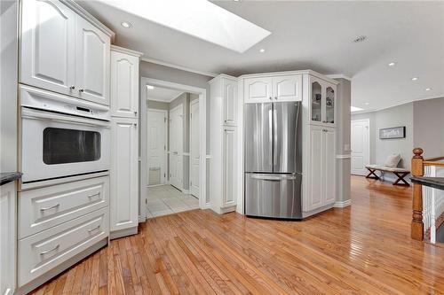 Right off the kitchen, you will find the laundry room - 40 Dunrobin Drive, Caledonia, ON - Indoor Photo Showing Kitchen