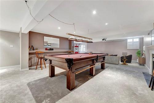 Custom built Billiards Table, virtually staged entertainment area behind it - 40 Dunrobin Drive, Caledonia, ON - Indoor Photo Showing Other Room