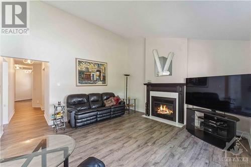 1157 Ambercrest Street, Ottawa, ON - Indoor Photo Showing Living Room With Fireplace