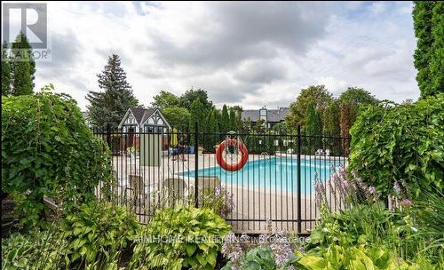 50 - 3050 Orleans Road, Mississauga, ON - Outdoor With In Ground Pool