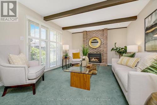 27 Lorne Scots Drive, Milton, ON - Indoor Photo Showing Living Room With Fireplace