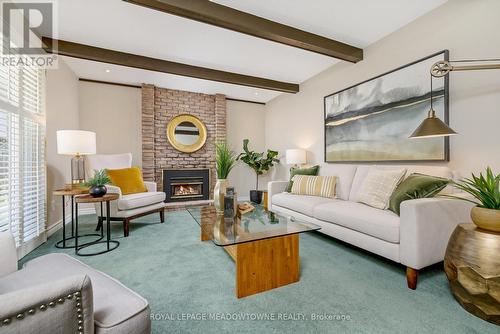 27 Lorne Scots Drive, Milton, ON - Indoor Photo Showing Living Room With Fireplace