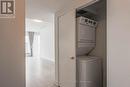 5303 - 181 Dundas Street E, Toronto, ON  - Indoor Photo Showing Laundry Room 