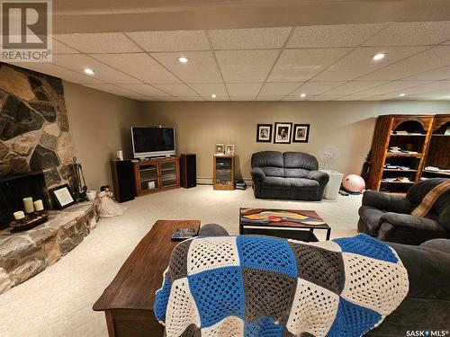 205 1St Street E, Carlyle, SK - Indoor Photo Showing Other Room With Fireplace