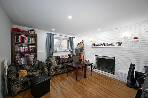 51 East 39Th Street, Hamilton, ON - Indoor Photo Showing Living Room With Fireplace