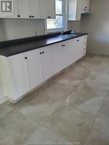 15 Jones, Leamington, ON - Indoor Photo Showing Kitchen With Double Sink