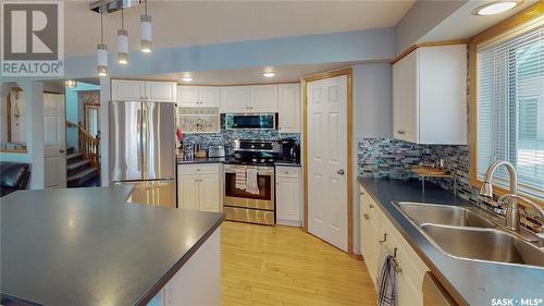 3566 Waddell Crescent E, Regina, SK - Indoor Photo Showing Kitchen With Double Sink