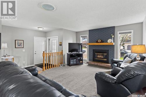 123 Wilkinson Crescent, Saskatoon, SK - Indoor Photo Showing Living Room With Fireplace