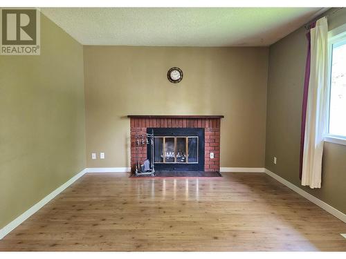 4714 Parker Court, 108 Mile Ranch, BC - Indoor Photo Showing Living Room With Fireplace