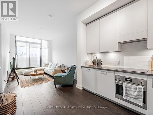 210 - 33 Frederick Todd Way, Toronto (Thorncliffe Park), ON - Indoor Photo Showing Kitchen With Upgraded Kitchen