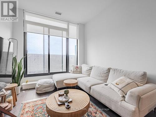 210 - 33 Frederick Todd Way, Toronto (Thorncliffe Park), ON - Indoor Photo Showing Living Room