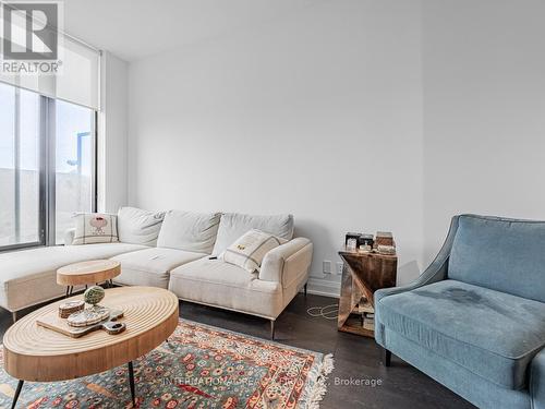 210 - 33 Frederick Todd Way, Toronto (Thorncliffe Park), ON - Indoor Photo Showing Living Room