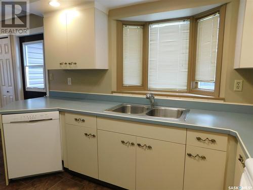 724 4Th Street E, Assiniboia, SK - Indoor Photo Showing Kitchen With Double Sink