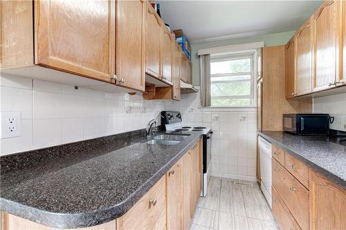 106 Merna Avenue, Hamilton, ON - Indoor Photo Showing Kitchen With Double Sink