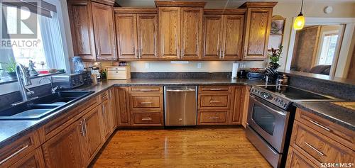 456 Abel Drive, Crooked Lake, SK - Indoor Photo Showing Kitchen With Double Sink