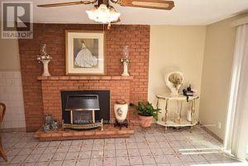 25 Lenthall Avenue, Toronto, ON - Indoor With Fireplace