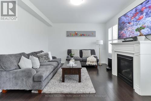 28 Goldeneye Drive, East Gwillimbury, ON - Indoor Photo Showing Living Room With Fireplace