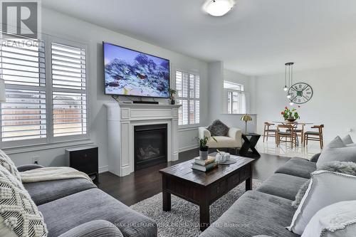 28 Goldeneye Drive, East Gwillimbury, ON - Indoor Photo Showing Living Room With Fireplace