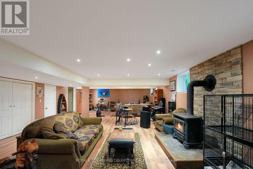 2435 Elm Tree Road, Kawartha Lakes, ON - Indoor Photo Showing Other Room With Fireplace