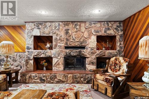 124 Elmview Road, Regina, SK - Indoor Photo Showing Living Room With Fireplace