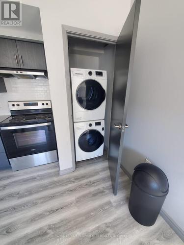 A 407 - 275 Larch Street N, Waterloo, ON - Indoor Photo Showing Laundry Room