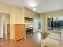 Surrey, BC  - Indoor Photo Showing Living Room With Fireplace 