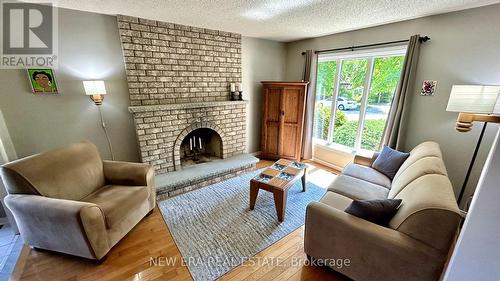 2967 Rainwater Drive, Mississauga, ON - Indoor Photo Showing Living Room With Fireplace
