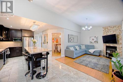 3932 Periwinkle Crescent, Mississauga, ON - Indoor With Fireplace