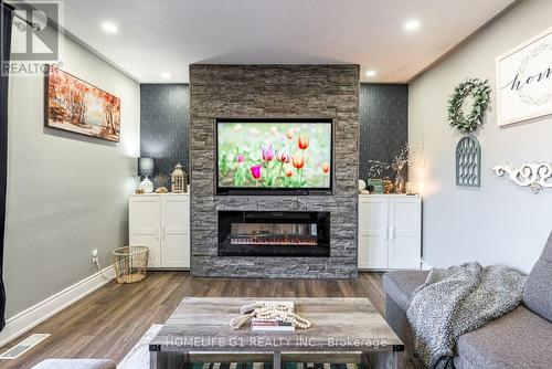 17 Stonegate Drive, St. Catharines, ON - Indoor Photo Showing Living Room With Fireplace