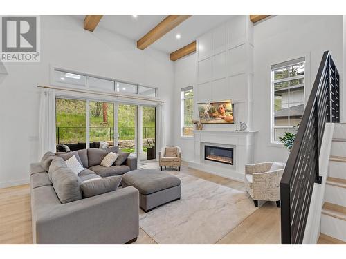 201 Summer Wood Drive, Kelowna, BC - Indoor Photo Showing Living Room With Fireplace