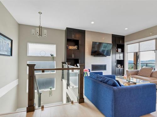 6548 Blackcomb Place, Vernon, BC - Indoor Photo Showing Living Room With Fireplace