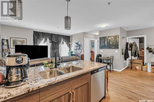 317 1715 Badham Boulevard, Regina, SK - Indoor Photo Showing Kitchen With Double Sink