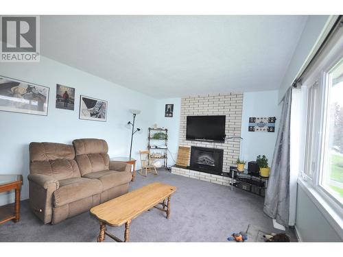 950 Western Avenue, Williams Lake, BC - Indoor Photo Showing Living Room With Fireplace