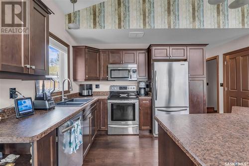 3 Mathews Crescent, Turtle Lake, SK - Indoor Photo Showing Kitchen With Double Sink