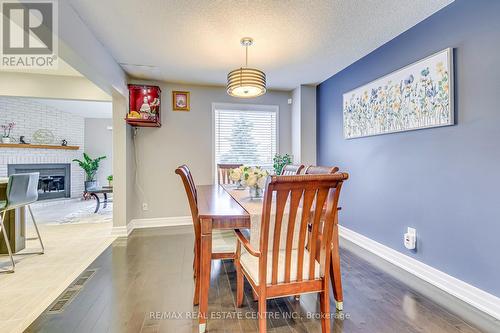1154 Charminster Crescent, Mississauga, ON - Indoor Photo Showing Dining Room With Fireplace