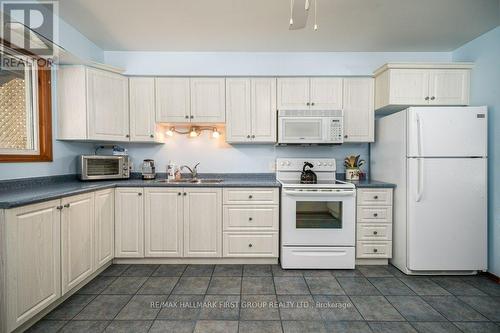 25 Dollar Crescent, Greater Napanee, ON - Indoor Photo Showing Kitchen With Double Sink