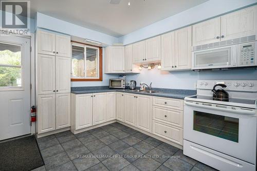 25 Dollar Crescent, Greater Napanee, ON - Indoor Photo Showing Kitchen With Double Sink