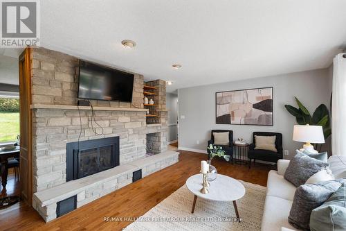 3260 Regional Rd 18 Road N, Clarington, ON - Indoor Photo Showing Living Room With Fireplace