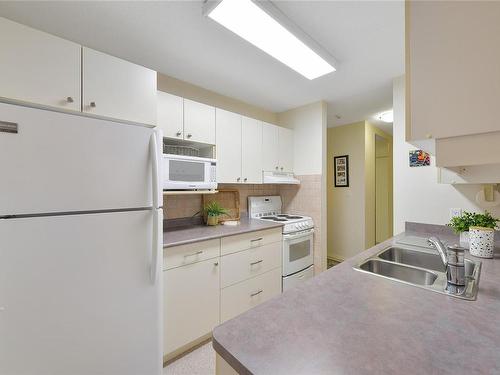 204-1041 Rockland Ave, Victoria, BC - Indoor Photo Showing Kitchen With Double Sink