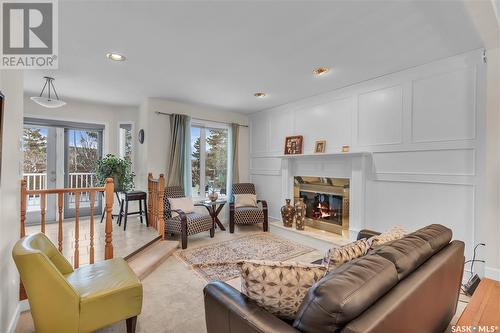 206 Braemar Bay, Saskatoon, SK - Indoor Photo Showing Living Room With Fireplace