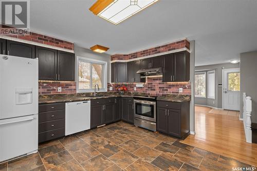 105 25Th Street E, Prince Albert, SK - Indoor Photo Showing Kitchen With Double Sink