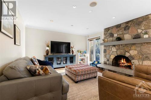 304 Mountbatten Avenue, Ottawa, ON - Indoor Photo Showing Living Room With Fireplace