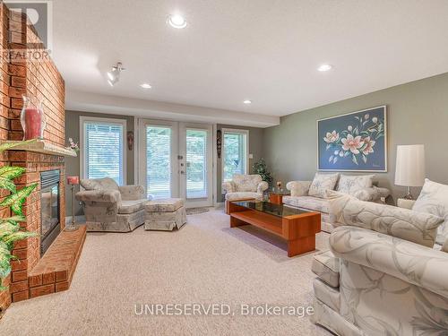 34 Briar Gate Way, New Tecumseth, ON - Indoor Photo Showing Living Room With Fireplace