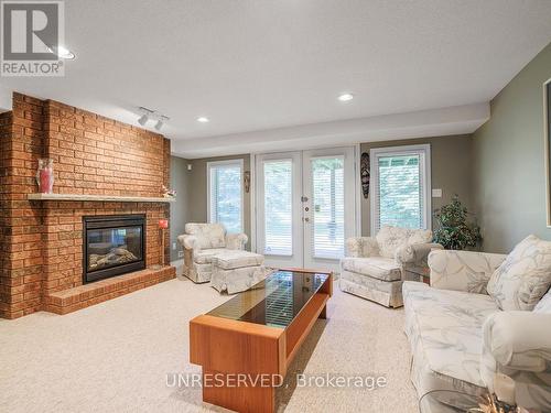 34 Briar Gate Way, New Tecumseth, ON - Indoor Photo Showing Living Room With Fireplace