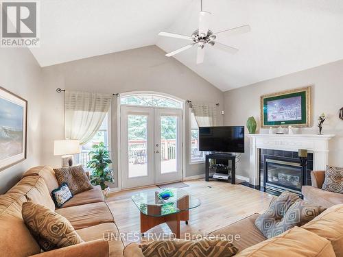 34 Briar Gate Way, New Tecumseth, ON - Indoor Photo Showing Living Room With Fireplace