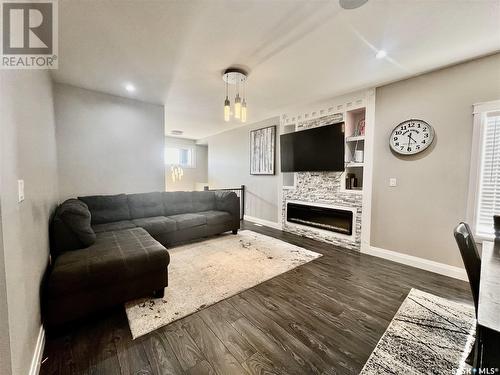 211 Bentley Court, Saskatoon, SK - Indoor Photo Showing Living Room With Fireplace