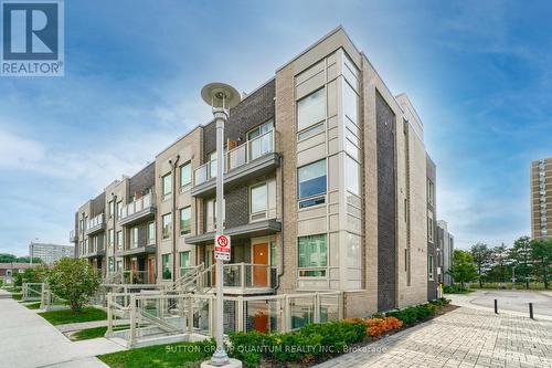 105 - 7 Applewood Lane, Toronto, ON - Outdoor With Facade