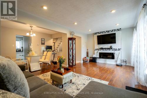 57 - 1235 Radom Street, Pickering, ON - Indoor Photo Showing Living Room With Fireplace