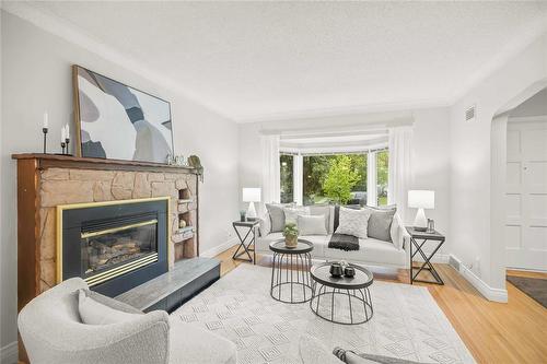 217 Linwood Street, Winnipeg, MB - Indoor Photo Showing Living Room With Fireplace