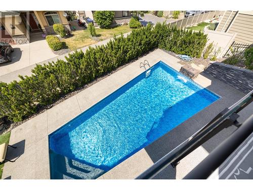 682 Peridot Court, Kelowna, BC - Outdoor With In Ground Pool